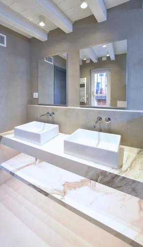 Koupelna v ubytování Hotel Rivalago