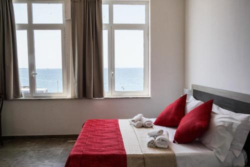 Una cama o camas en una habitación de Hotel Virgilio