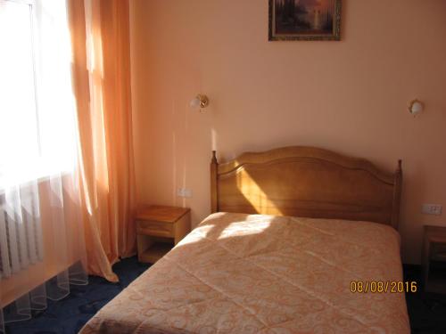 Katil atau katil-katil dalam bilik di Hotel Vinnytsia Sawoy