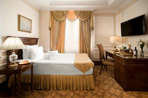 Letto o letti in una camera di Nobil Luxury Boutique Hotel