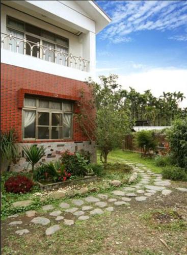 Ein Garten an der Unterkunft Dongguang Zhixing Homestay
