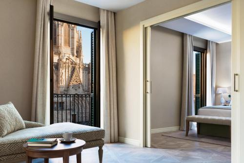 a room with a view of the eiffel tower at Lamaro Hotel in Barcelona