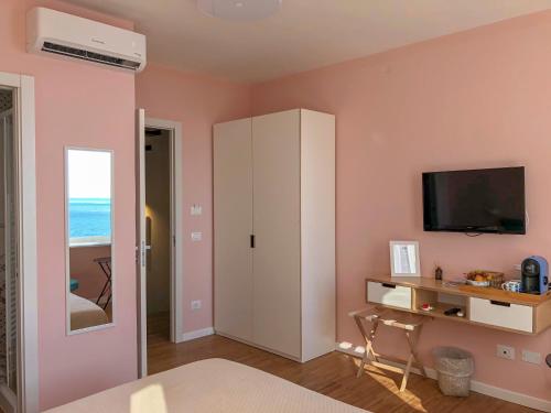 TV a/nebo společenská místnost v ubytování Ai Pesci Room Rental