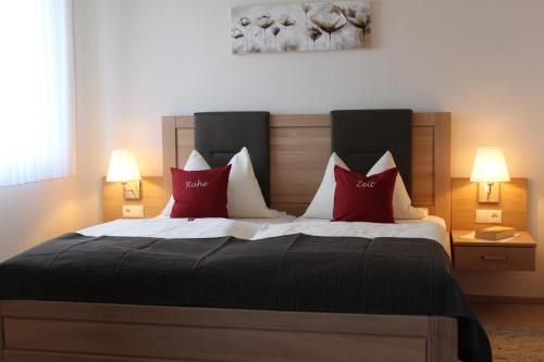 Ένα ή περισσότερα κρεβάτια σε δωμάτιο στο Bio-Hotel Melter