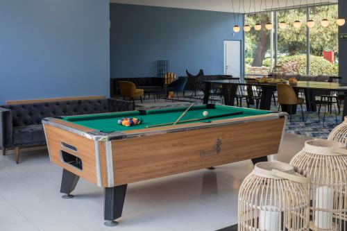 a pool table in the middle of a room at Falkensteiner Club Funimation Borik in Zadar