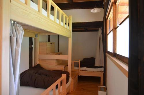 Postel nebo postele na pokoji v ubytování Guesthouse Soranoie