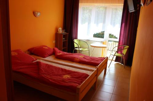 Katil atau katil-katil dalam bilik di Na Wiejskiej