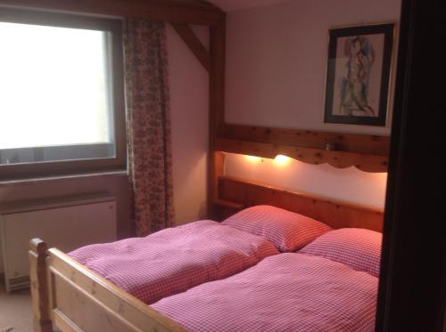 Postelja oz. postelje v sobi nastanitve Ferienwohnung Zell am See