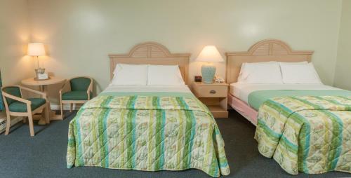 Ένα ή περισσότερα κρεβάτια σε δωμάτιο στο Southfleet Motor Inn