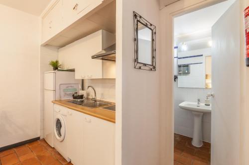 Koupelna v ubytování Apartamentos Gadi Corral Siglo XVI