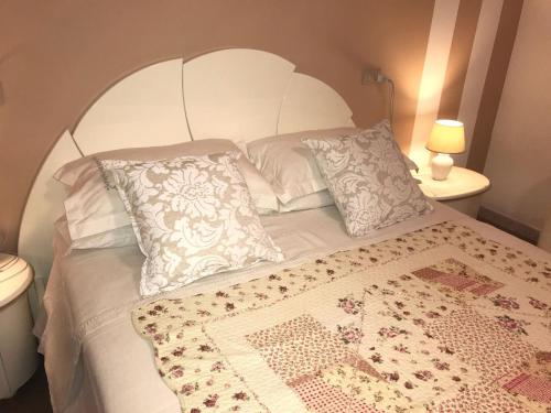 Een bed of bedden in een kamer bij B&B Amy&Julie