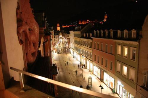 a view of a city street at night at The Dubliner Hotel & Irish Pub in Heidelberg