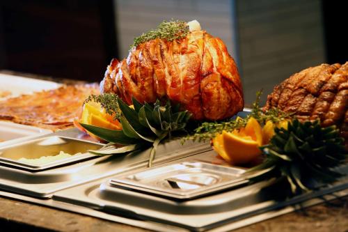 a plate of food with a turkey and other foods at Best Western Heath Court Hotel in Newmarket