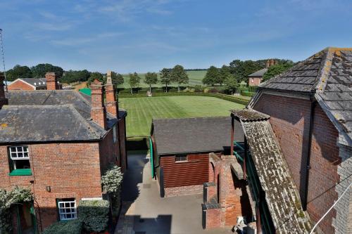 an overhead view of a group of brick buildings at Best Western Heath Court Hotel in Newmarket