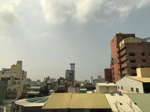 a view of a city skyline with buildings at Sunrise Hotel in Tainan