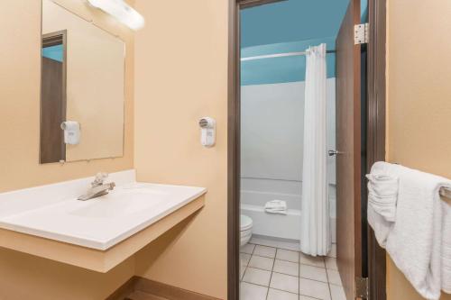a bathroom with a sink and a shower at Super 8 by Wyndham Dillon/Breckenridge Area in Dillon
