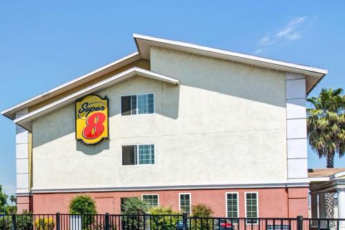 a fast food building with a sign on it at Super 8 by Wyndham Sacramento/Florin Rd in Sacramento