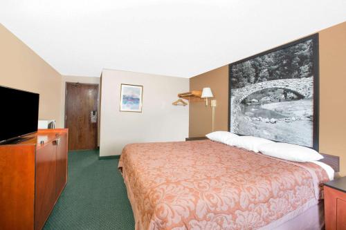 Super 8 by Wyndham Sioux City/Morningside Areaにあるベッド