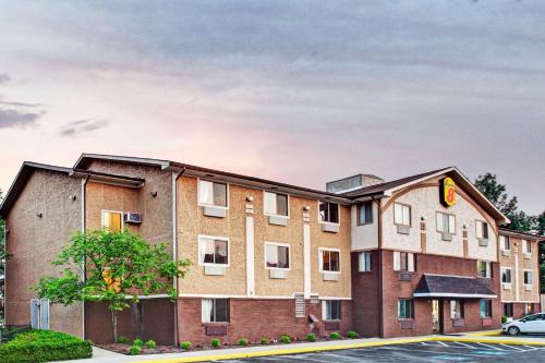 a rendering of a apartment building at Super 8 by Wyndham Baltimore/Essex Area in Essex