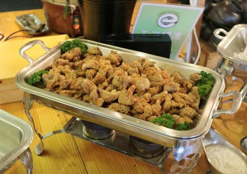 a pan of food with broccoli on a table at Uomisaki Hotel in Atami