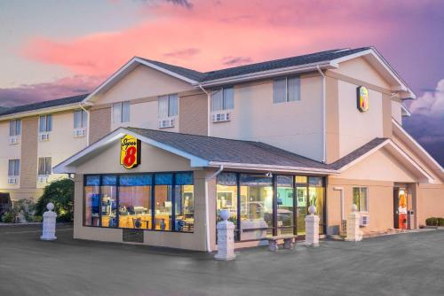 a rendering of a hotel with a restaurant at Super 8 by Wyndham Corbin KY in Corbin