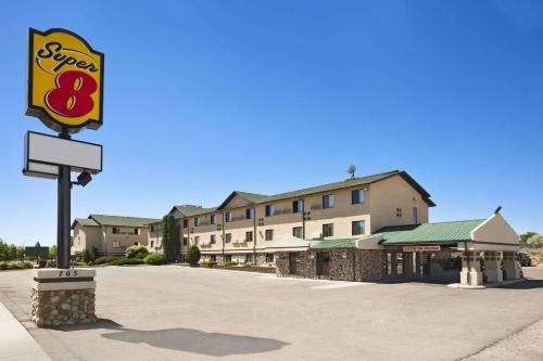 a hotel with a sign in front of a building at Super 8 by Wyndham Idaho Falls in Idaho Falls