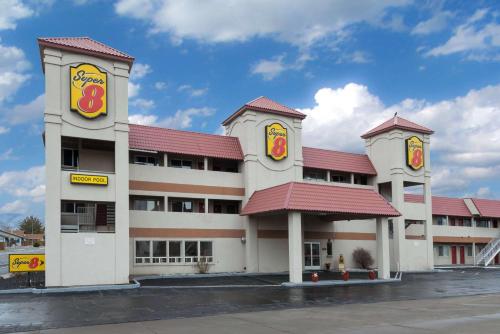 a building with a fast food restaurant at Super 8 by Wyndham Fernley in Fernley