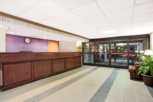 a lobby of a hospital with a waiting room at Days Inn by Wyndham Newport News City Center Oyster Point in Newport News