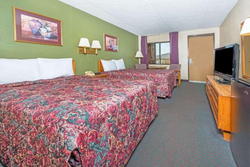 TV o dispositivi per l'intrattenimento presso Days Inn by Wyndham New Market I-81