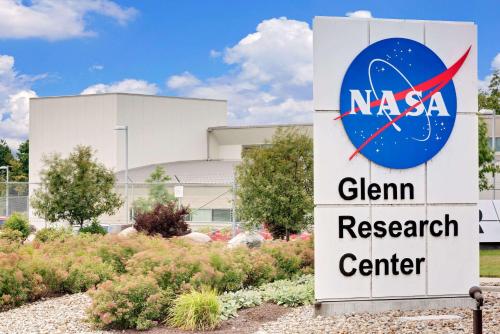 a sign in front of a nasa building at Ramada by Wyndham Cleveland Airport West in Fairview Park