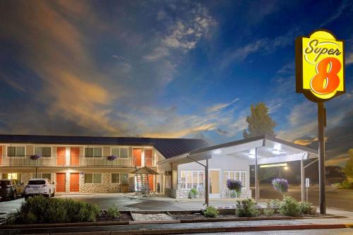 a super sign in front of a motel at Super 8 by Wyndham Alturas in Alturas