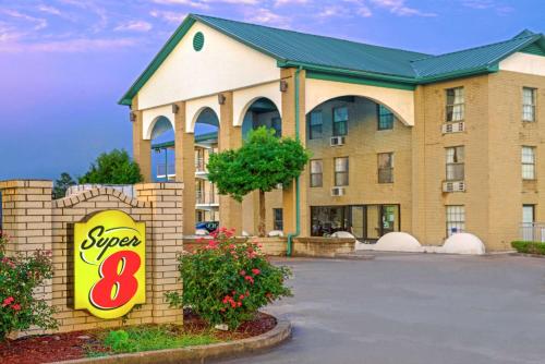 a sign for a super hotel at Super 8 by Wyndham Lakeland in Lakeland