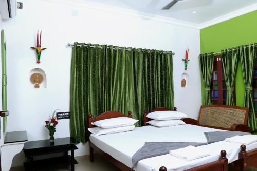 Una cama o camas en una habitación de Jasmin Villa