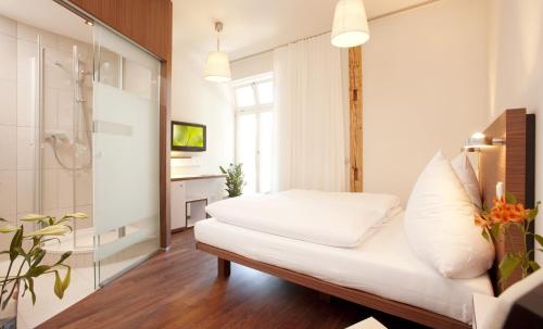 Ліжко або ліжка в номері Hotel Constantia