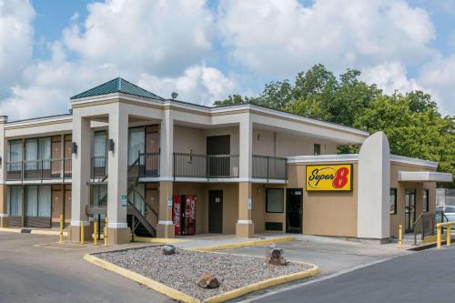 a building with a sign in front of it at Super 8 by Wyndham Duncan in Duncan