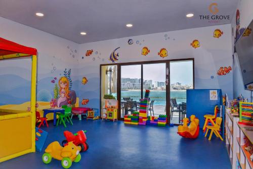 a childs play room with toys in it at The Grove Resort Bahrain in Manama