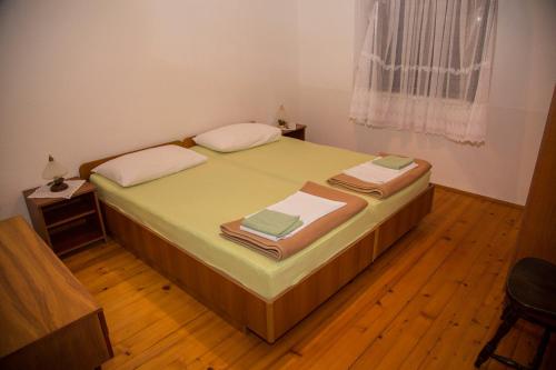 Postel nebo postele na pokoji v ubytování Apartman Marijana Smojver