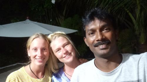a group of three people posing for a picture at The Tasty Tuna Cabana in Arugam Bay