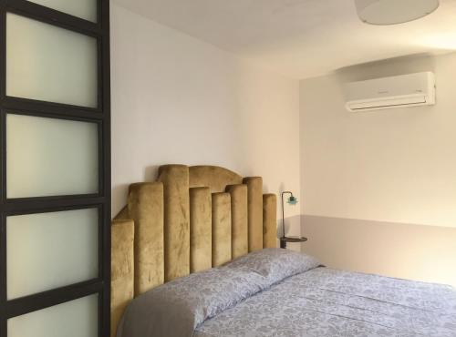 Ένα ή περισσότερα κρεβάτια σε δωμάτιο στο Agave Room Rental
