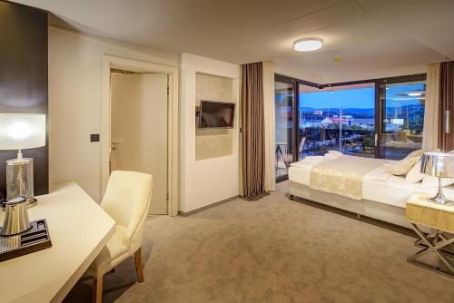 Ένα ή περισσότερα κρεβάτια σε δωμάτιο στο Hotel Maritime