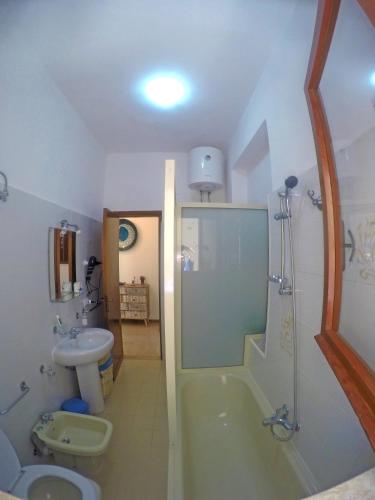 a bathroom with a shower and a sink and a toilet at Piana delle Galee in Scilla
