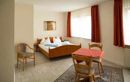 Katil atau katil-katil dalam bilik di Hotel Janssen