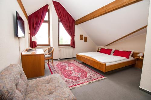 Postel nebo postele na pokoji v ubytování Hotel Janssen
