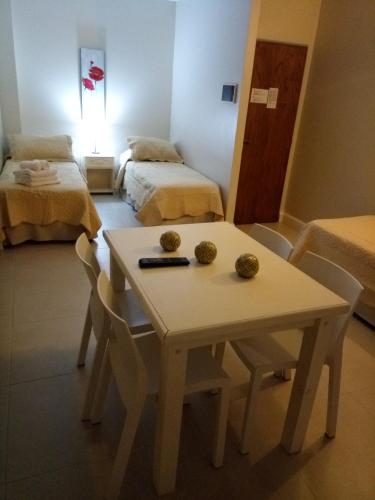 Cama o camas de una habitación en Apart Hotel Comra