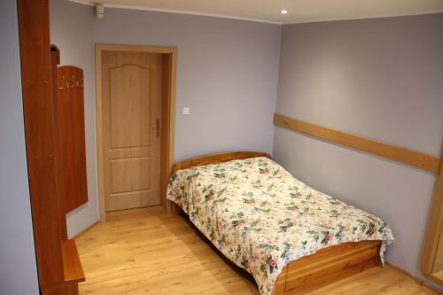 Łóżko lub łóżka w pokoju w obiekcie Apartament AQUA