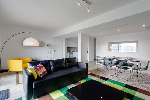 Posezení v ubytování Marvellous Seafront Apartment