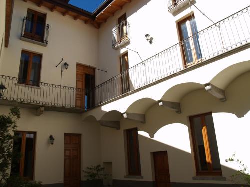 a row of balconies on a building at Casa Botta - Luino Lago Maggiore in Luino