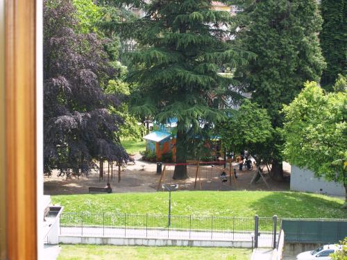 a view of a park with a playground at Casa Botta - Luino Lago Maggiore in Luino