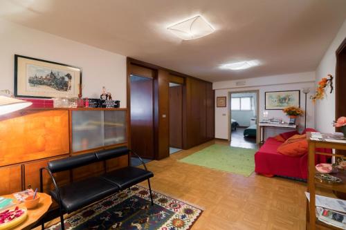 a living room with a couch and a bed at Bed and Breakfast Miotto in Montegalda