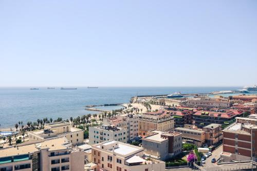 an aerial view of a city and the ocean at B&B Seataly by W Signature Experiences in Civitavecchia